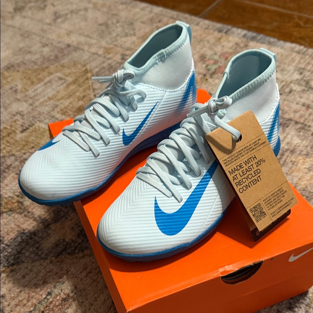 Nike White and Blue High-Top Cleats